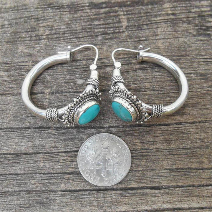 Pendientes elegantes de plata esterlina con turquesa