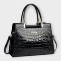 Emilie | Bolso de mano de cuero de cocodrilo brillante