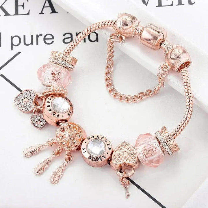 Pulsera Atrapa-Sueños Rosa con Charms de Plata Esterlina Incluidos