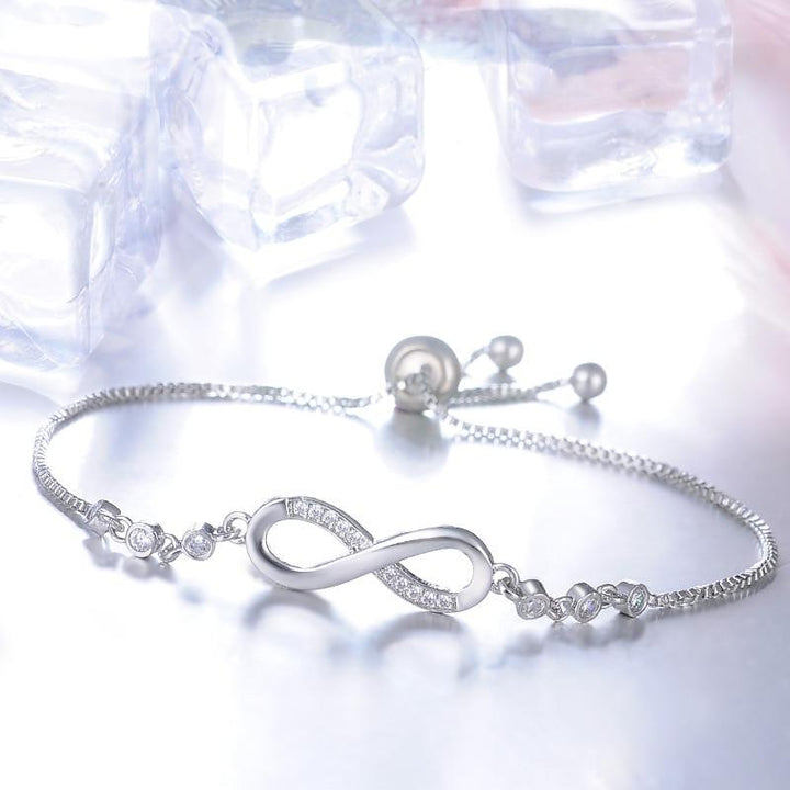 Pulsera ajustable chic en oro rosa en forma de infinito