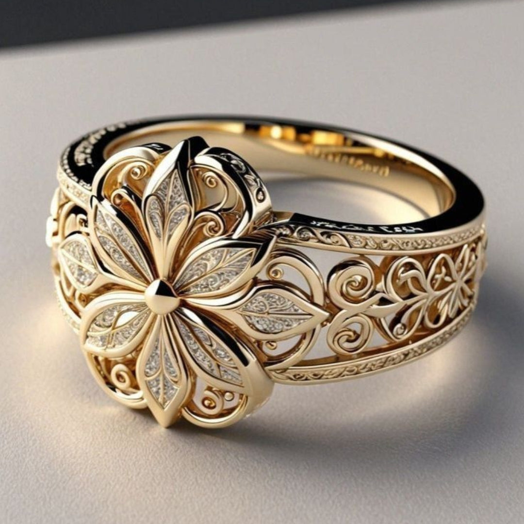 Anillo dorado con zircones florales
