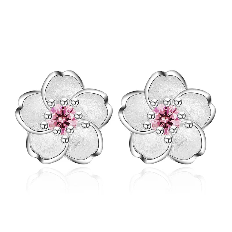 Pendientes de botón en forma de flor con zirconitas