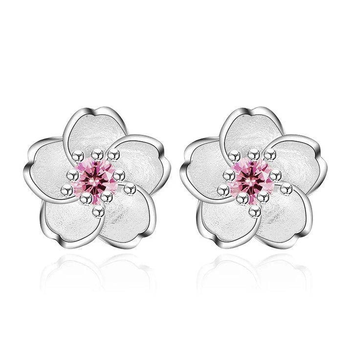 Pendientes de botón en forma de flor con zirconitas