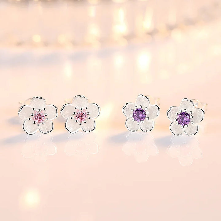 Pendientes de botón en forma de flor con zirconitas