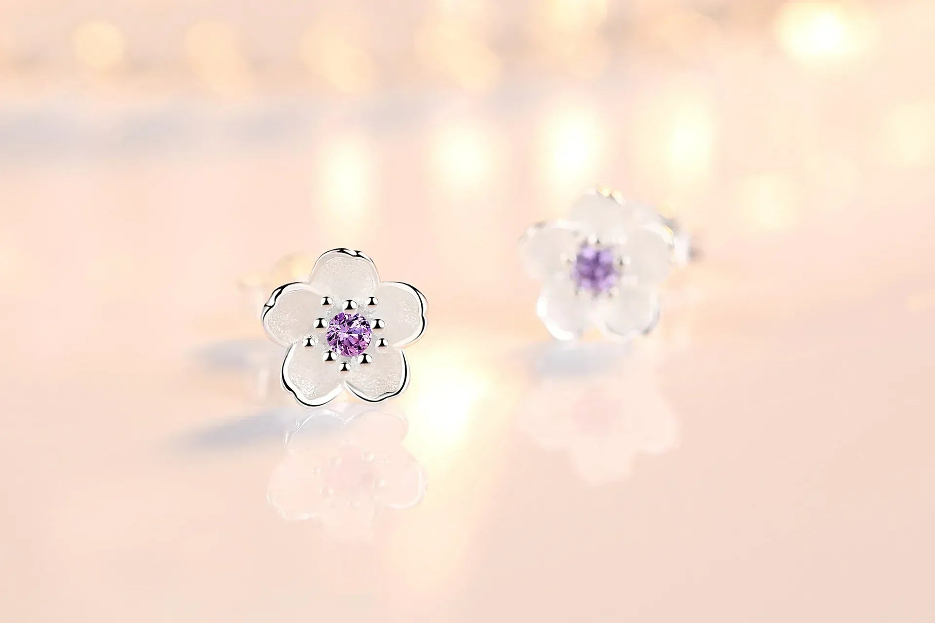 Pendientes de botón en forma de flor con zirconitas