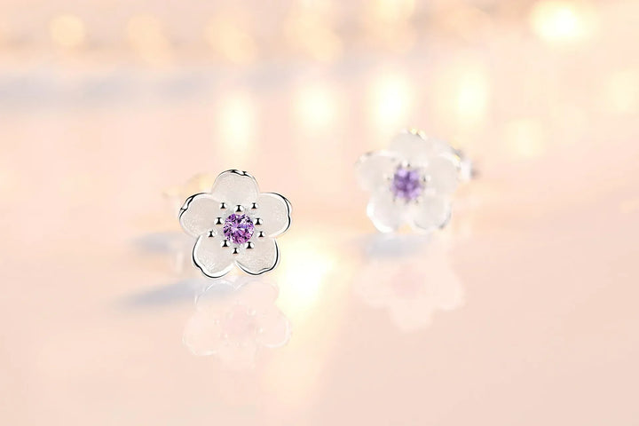 Pendientes de botón en forma de flor con zirconitas