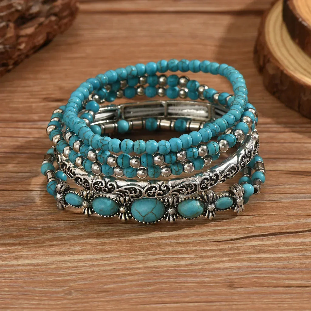 Conjunto de pulseras boho con perlas turquesas
