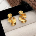 Pendientes de Flor en Plata y Oro de 18K