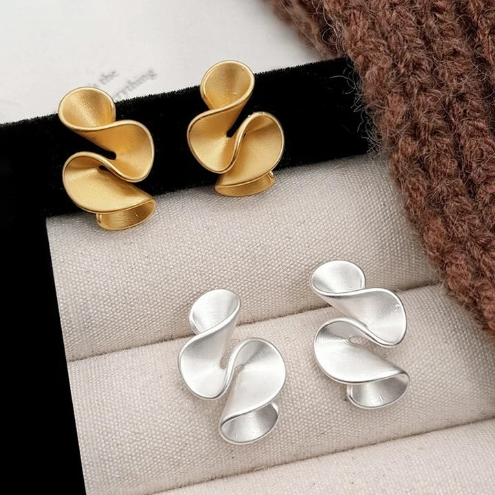 Pendientes de Flor en Plata y Oro de 18K
