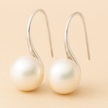 Pendientes elegantes en forma de gota con perlas