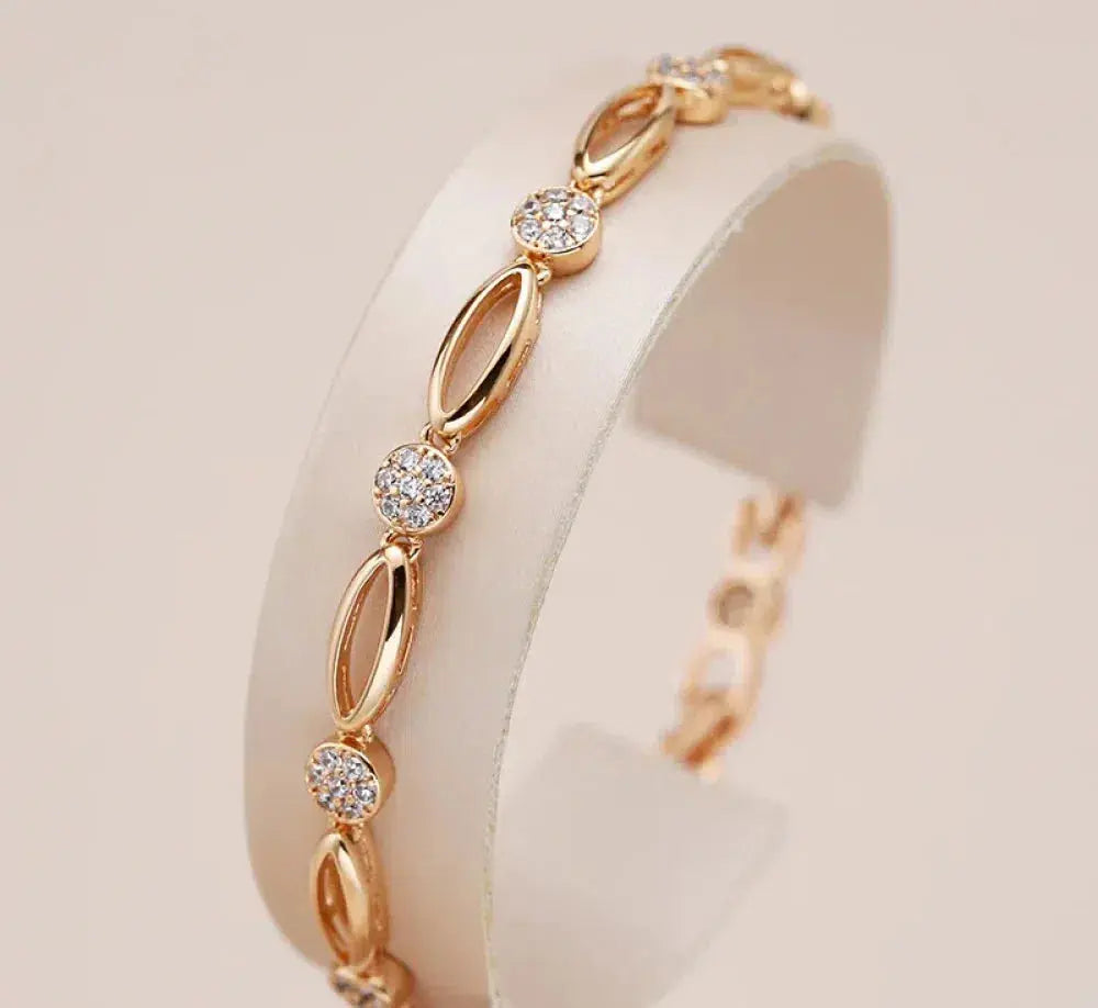 Pulsera elegante de oro con zirconia