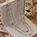Collar elegante de oro con perlas