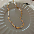 Collar elegante en oro y plata