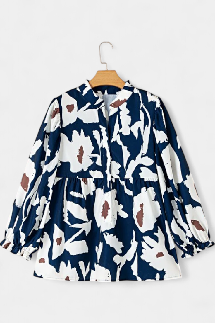 Blusa Filomena con Media Abotonadura y Mangas Abullonadas en Estampado Floral Abstracto