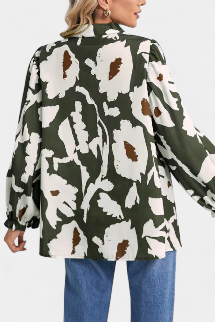 Blusa Filomena con Media Abotonadura y Mangas Abullonadas en Estampado Floral Abstracto