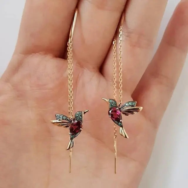 Pendientes de hilo con colibrí de oro y cristales