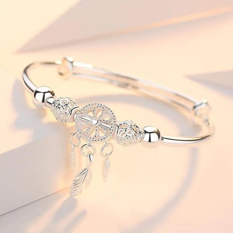 Pulsera de plata con colgante atrapa sueños