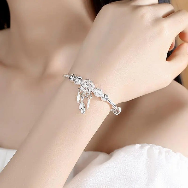 Pulsera de plata con colgante atrapa sueños